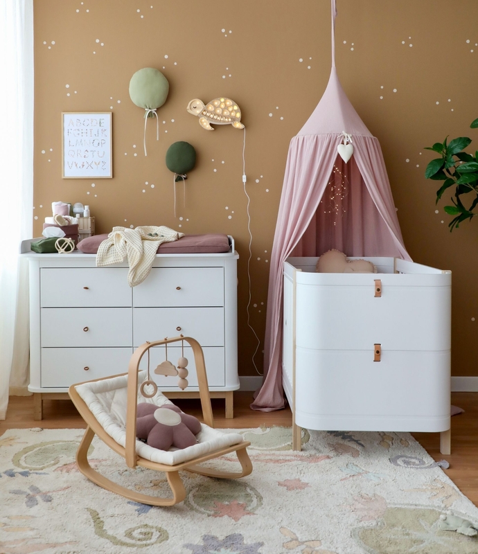 Babyroom With Cozy Decor In Purple, Green &amp; Beige